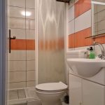Orange Apartment Bathroom